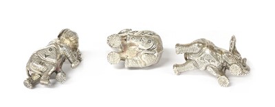 Lot 1315 - A set of three silver sculptures of elephants playing, by Patrick Mavros