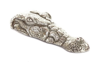 Lot 1321 - A silver sculpture of a crocodile head, by Patrick Mavros