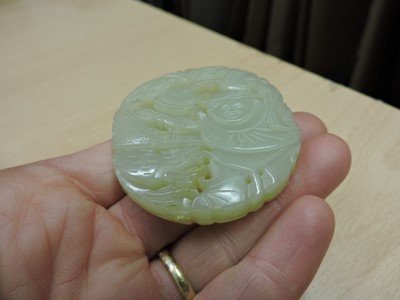 Lot 152 - A collection of Chinese jade pendants