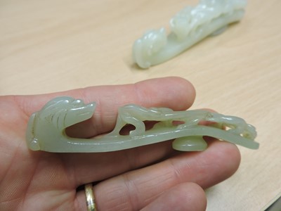 Lot 102 - A collection of Chinese jade belt hooks