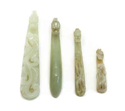 Lot 102 - A collection of Chinese jade belt hooks