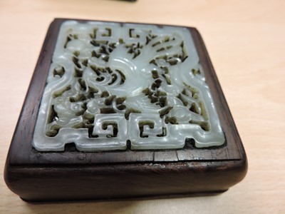 Lot 104 - A Chinese jade plaque