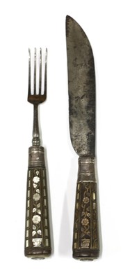 Lot 191 - A steel knife and fork