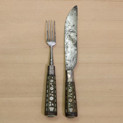Lot 191 - A steel knife and fork