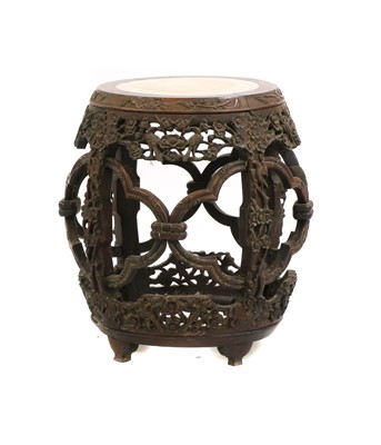 Lot 310 - A Chinese hardwood carved and pierced stand