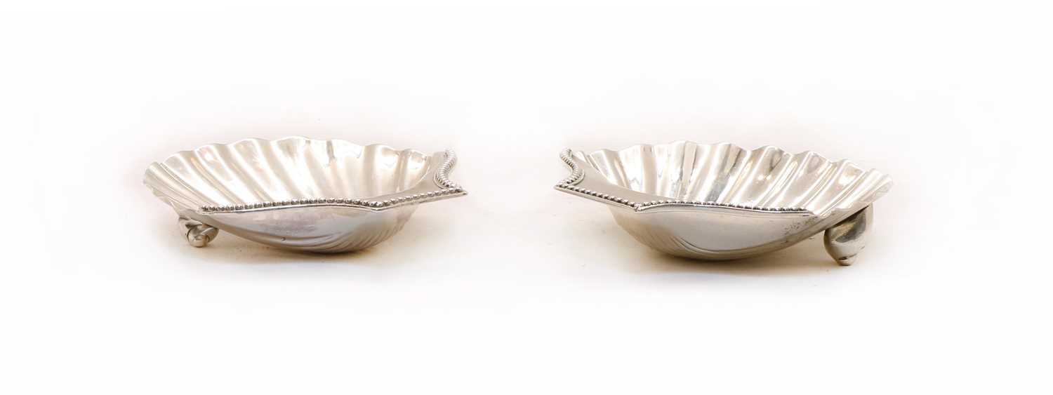 Lot 47 - A George III silver butter shells