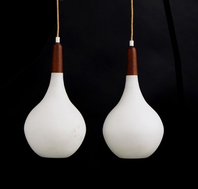 Lot 194 - A pair of Scandinavian teak-mounted pendant lights