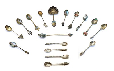 Lot 33 - A collection of seventeen silver, silver plated and enamelled souvenir spoons