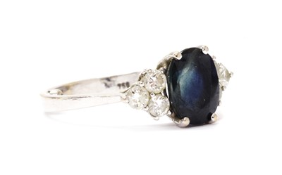 Lot 1283 - A white gold sapphire and diamond ring
