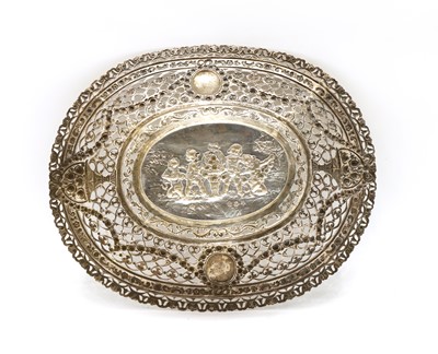 Lot 4 - A German silver basket, with pierced, pressed and repousse decoration