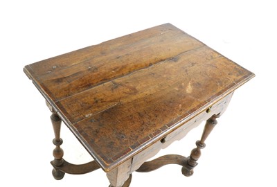 Lot 334 - A William and Mary provincial fruitwood side table