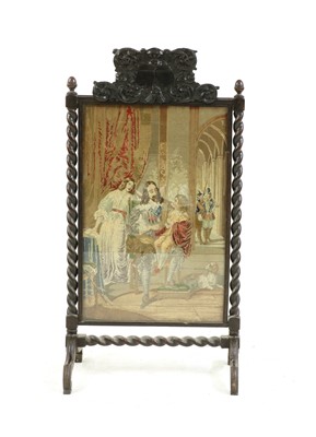 Lot 325 - A 19th century carved oak firescreen with ornate cresting