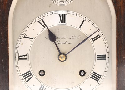 Lot 159 - An oak mantel clock