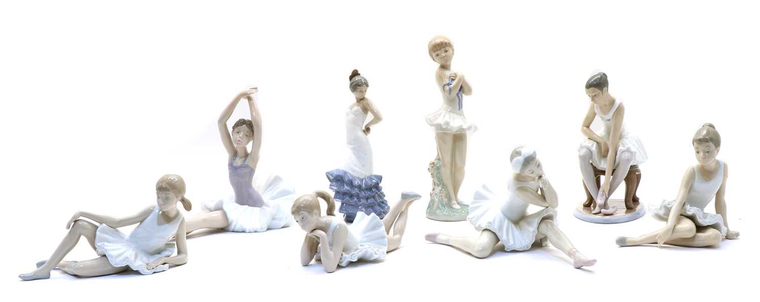 Lot 248 - A collection of Nao porcelain figures