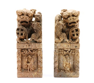 Lot 103 - A pair of Chinese soapstone bookends