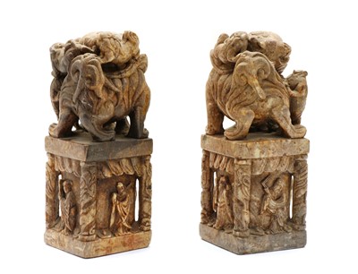 Lot 103 - A pair of Chinese soapstone bookends