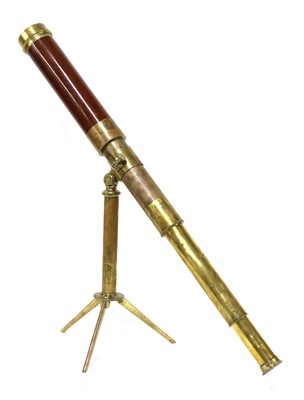Lot 237 - A cased table telescope and folding stand
