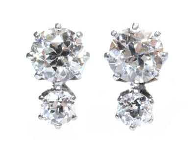 Lot 42 - A pair of two stone diamond stud earrings