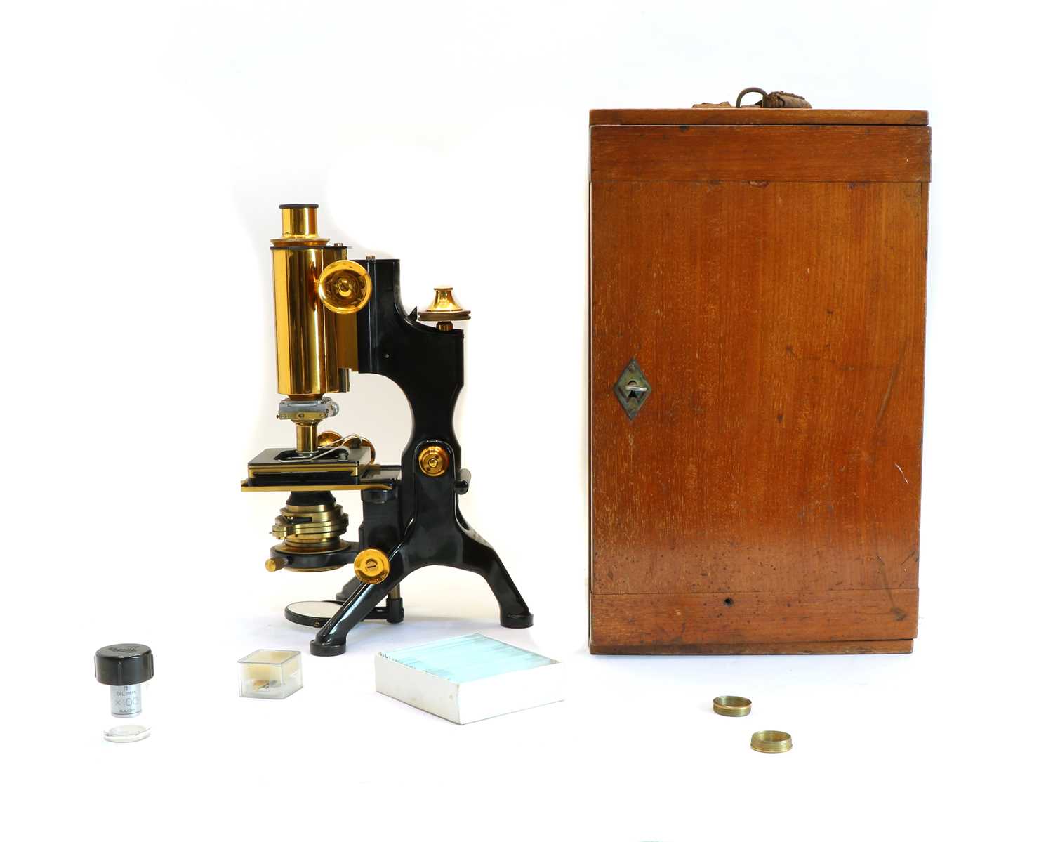 Lot 235 - A black and lacquered compound brass monocular microscope
