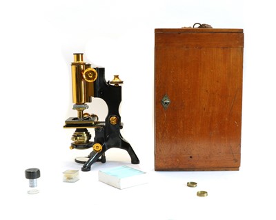 Lot 235A - A black and lacquered compound brass monocular microscope