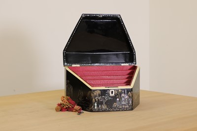 Lot 85 - A black and gilt mother-of-pearl inlaid papier mâché stationery box