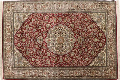Lot 391 - A pair of Persian silk rugs