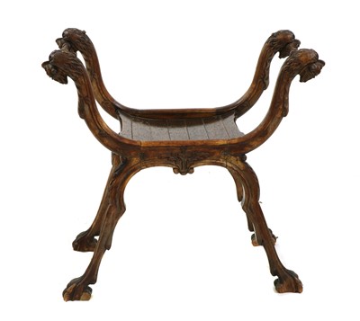 Lot 300 - A walnut X framed stool