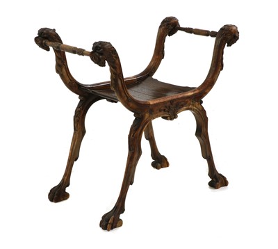 Lot 300 - A walnut X framed stool