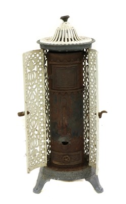 Lot 276 - A Victorian painted iron greenhouse heater