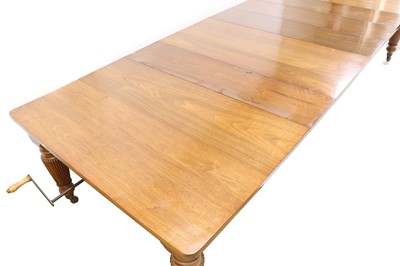 Lot 262 - A large late Victorian walnut wind-out dining table