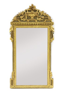 Lot 395 - A carved wood and gilt wall mirror