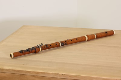Lot 251 - A boxwood and ivory flute