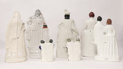 Lot 127 - A group of twenty of Staffordshire stoneware figurines