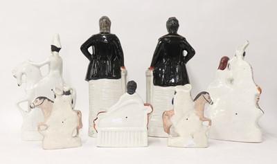 Lot 127 - A group of twenty of Staffordshire stoneware figurines