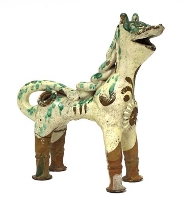 Lot 515 - A Turkish pottery aquamanile in the form of a lion