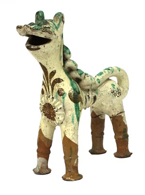 Lot 515 - A Turkish pottery aquamanile in the form of a lion