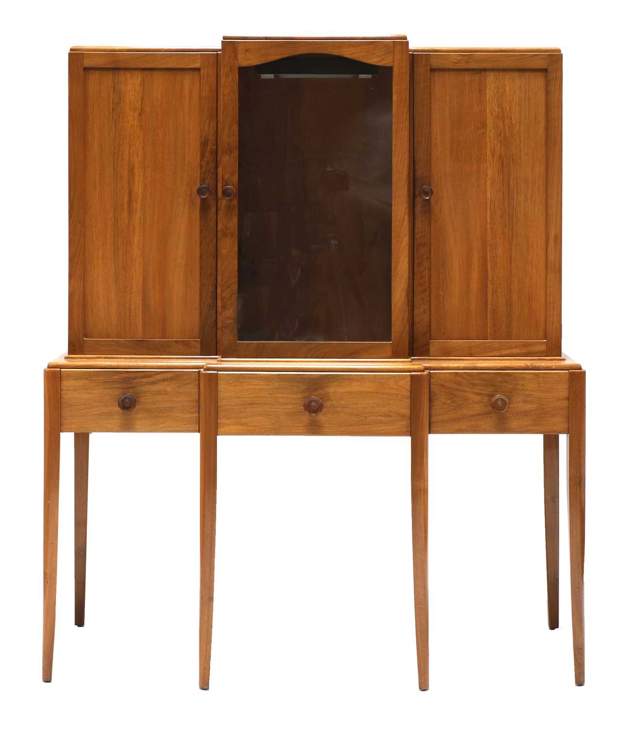 Lot 293 - A Gordon Russell Art Deco walnut breakfront cabinet