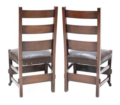 Lot 100 - A pair of American Arts and Crafts oak side chairs