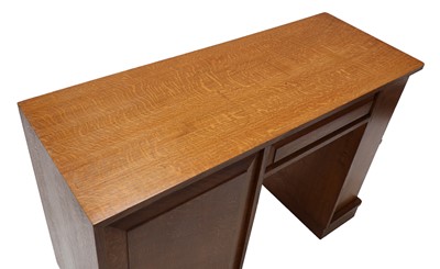 Lot 449 - An oak desk