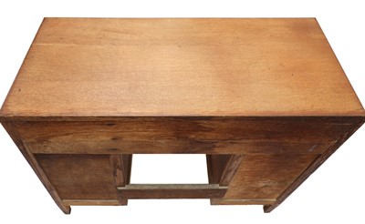 Lot 90 - A Cotswold School oak kneehole desk