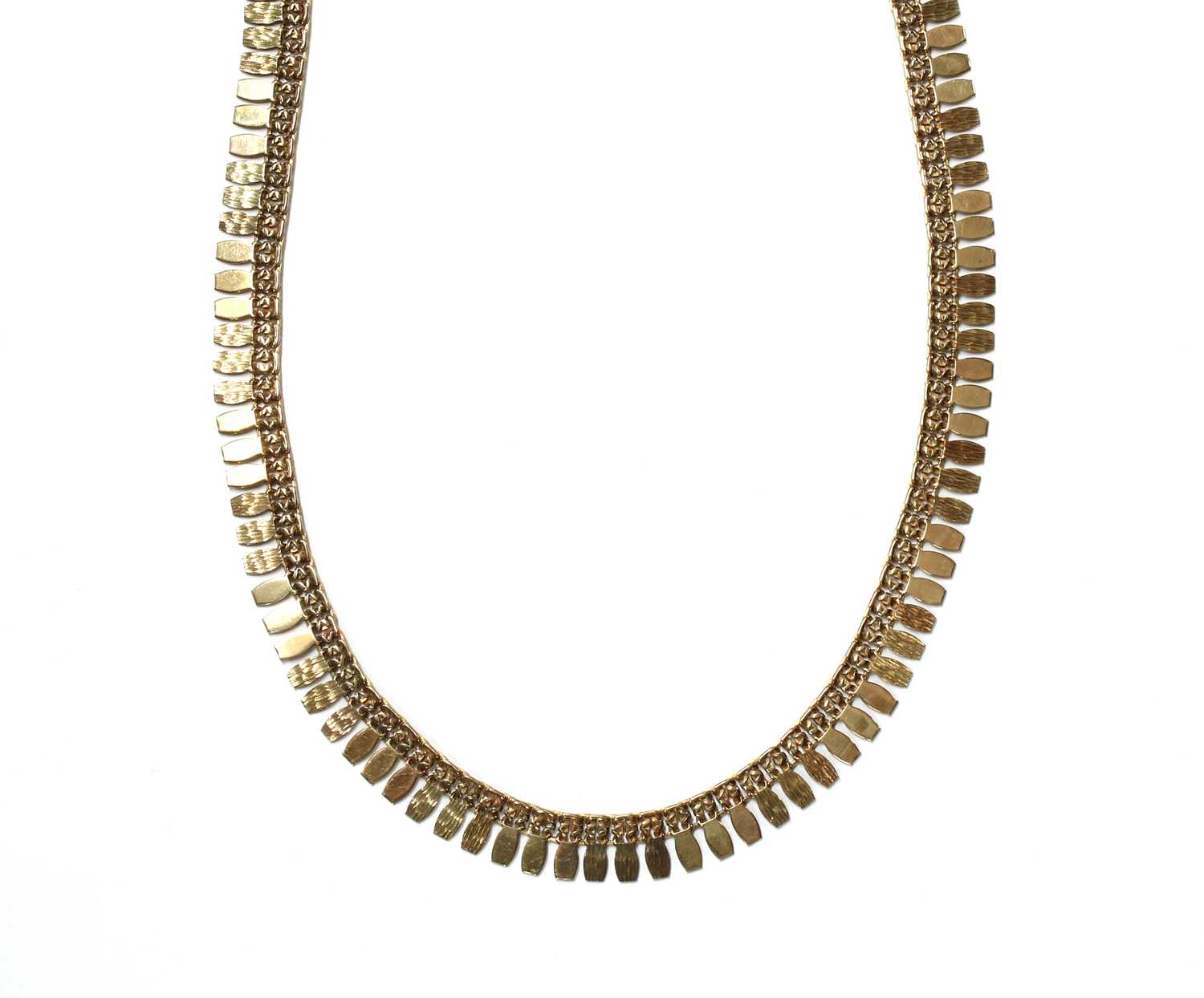 Lot 1058 - A gold fringe necklace
