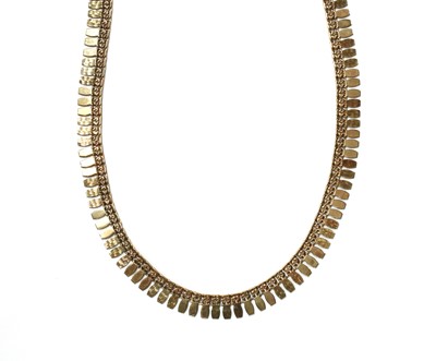 Lot 1058 - A gold fringe necklace