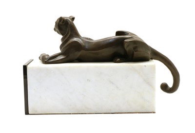 Lot 113 - A bronze of a panther lying on a white marble plinth