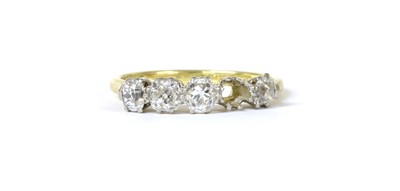 Lot 1175 - A gold diamond ring