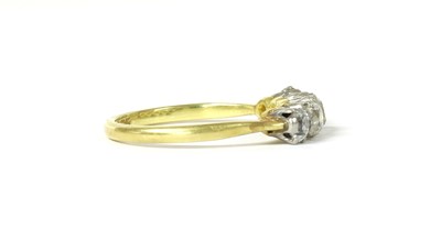 Lot 1175 - A gold diamond ring