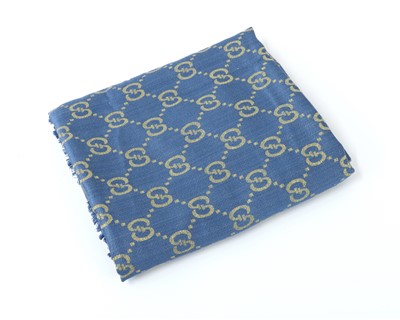 Lot 562 - A Gucci cashmere and silk blue and gold long scarf