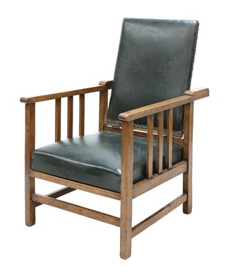 Lot 86 - An Arts and Crafts oak reclining armchair