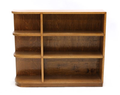 Lot 554 - An Arts & Crafts open-ended oak bookcase