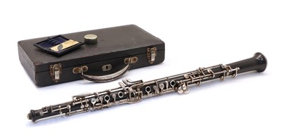 Lot 269 - A Cook & Son ebony oboe in case