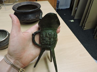Lot 106 - A Chinese bronze jue cup